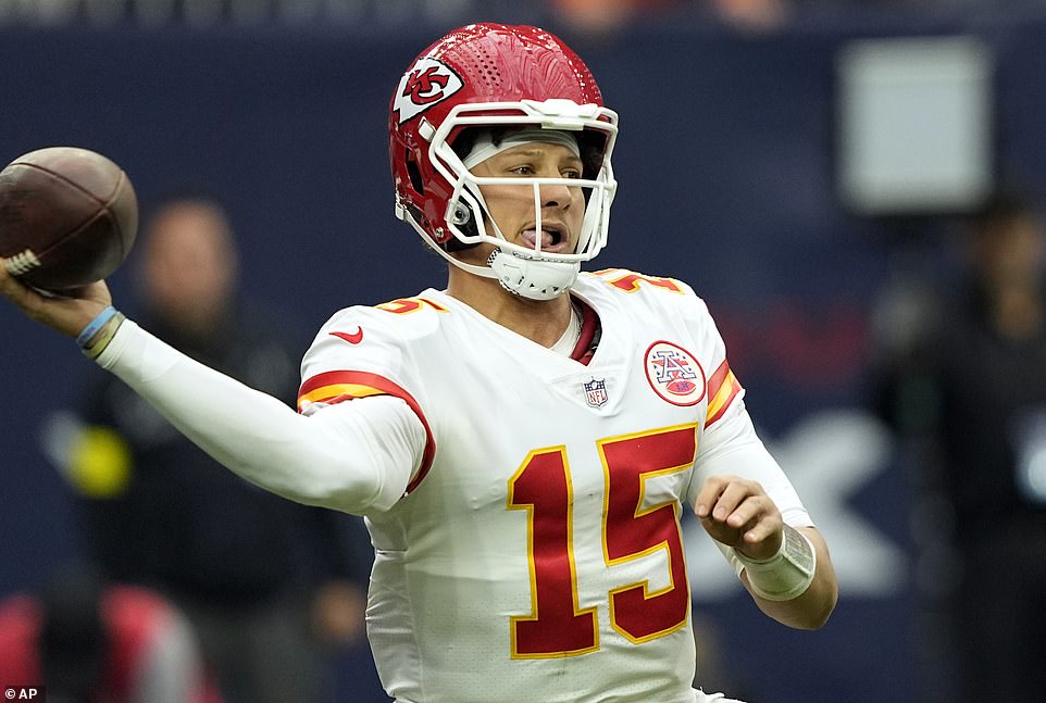 At work: Kansas City Chiefs quarterback Mahomes throws the ball during a game