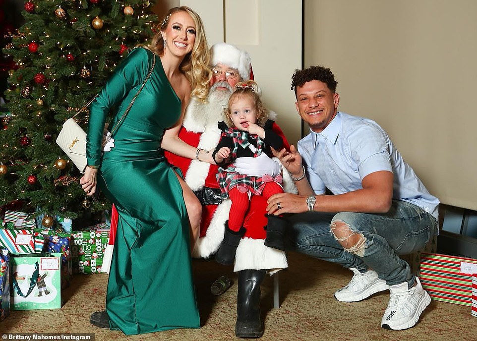 First time meeting Santa: Patrick Mahomes, 27, and his wife Brittany took their 21-month-old daughter Sterling to meet Santa Claus on Monday
