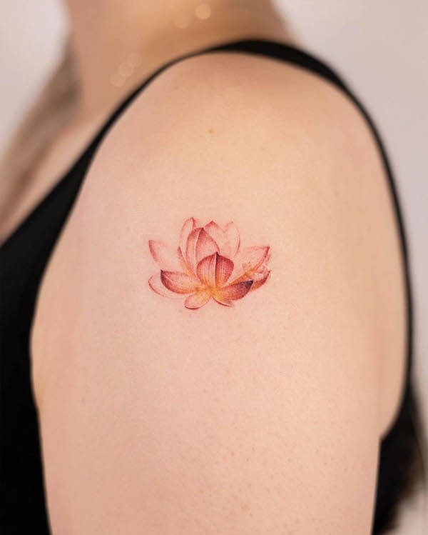 Cute lotus shoulder tattoo by @handitrip