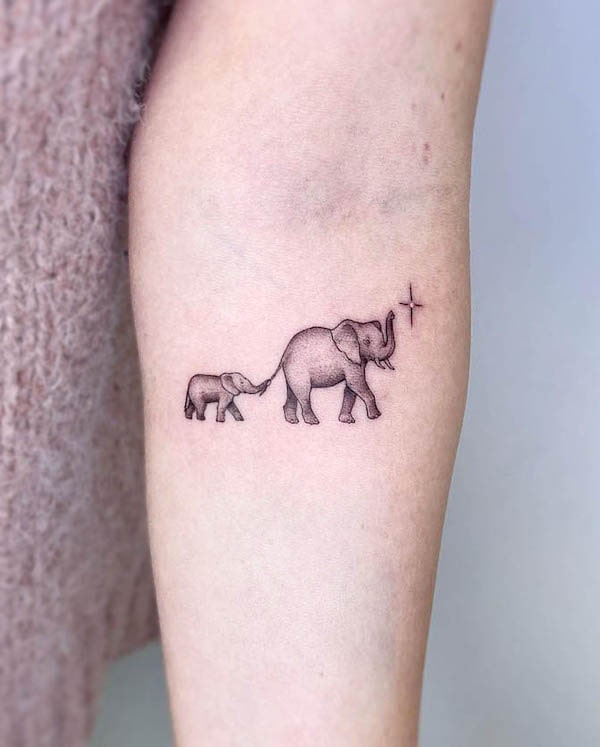 Elephant family tattoo by @disegnarti