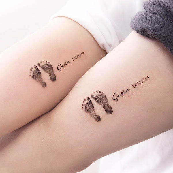 Footprint baby tattoo by @tattooist_nanci