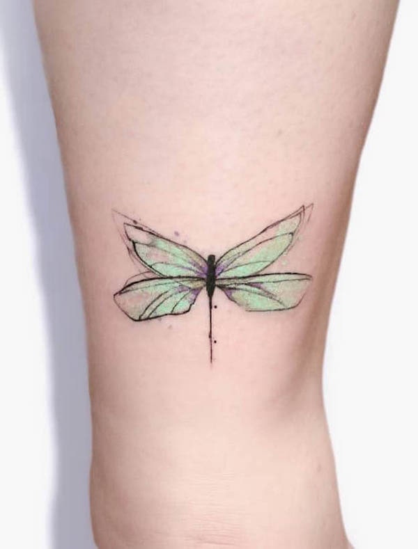 Green dragonfly tattoo by @elias.ap