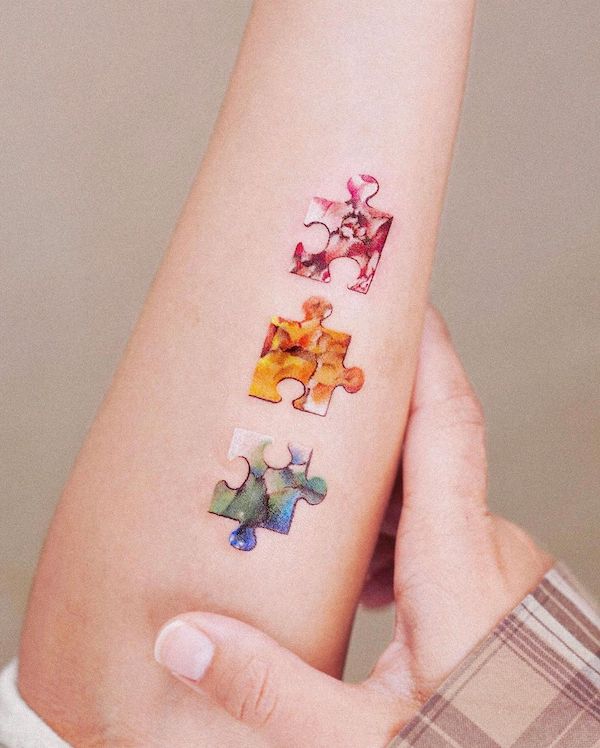 Puzzle pieces meaningful tattoo by @leean.ink