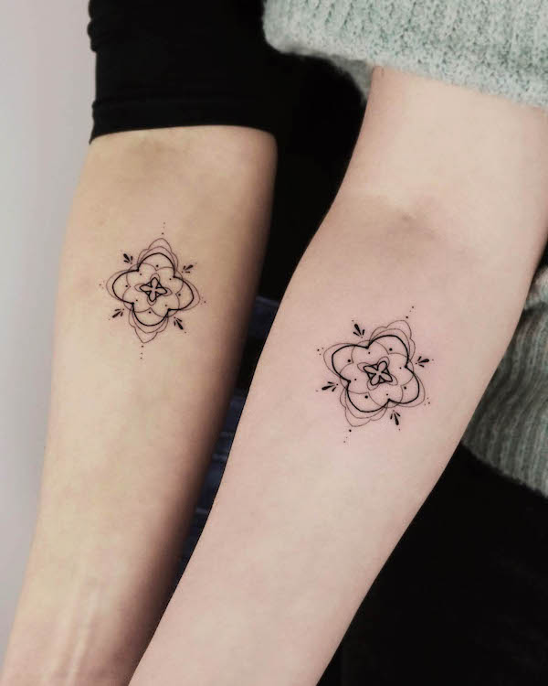 Small matching mandala tattoos by @maren.tattoo