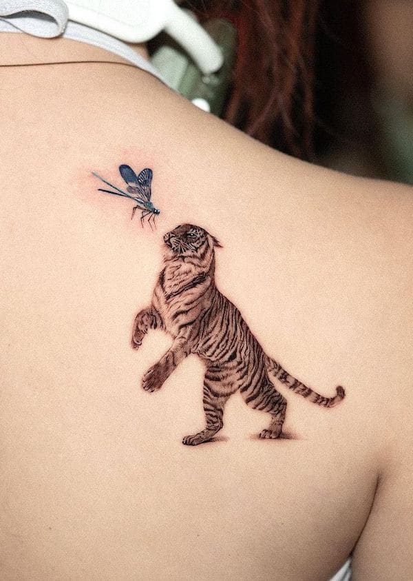 Tiger and dragonfly tattoo by @kimshine_tattoos