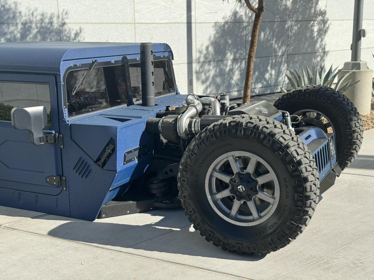 lamtac up close with the beast hummer h fitted with f engine and wide body transforming into a handsome monster at the sema show 655c8db6d6403 Up Close With The Beast: Hummer H1 Fitted With F1 Engine And Wide Body, Transforming Into A Handsome Monster At The SEMA Show