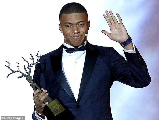 Kylian Mbappé of France and Paris Saint-Germain wins the Kopa Trophy for best young player at the Ballon D'Or ceremony at Le Grand Palais on December 3, 2018 in Paris, France