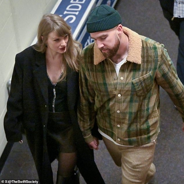 Taylor Swift gazes lovingly at her boyfriend Travis Kelce as they leave Arrowhead together