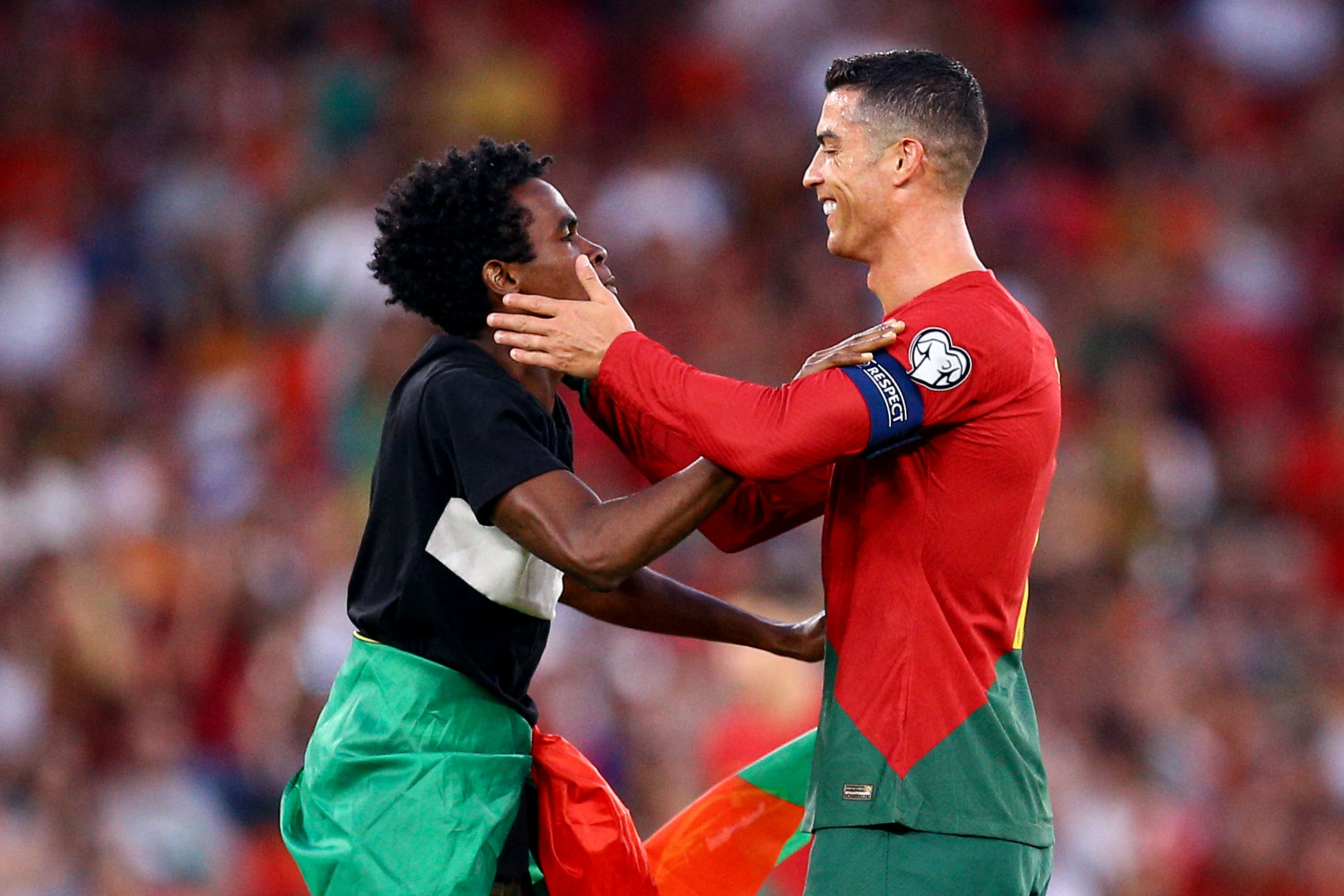 The Astonishing Moment When Ronaldo Was Lifted by a Pitch Intruder During Portugal's Euro Qualifier Against Bosnia 3