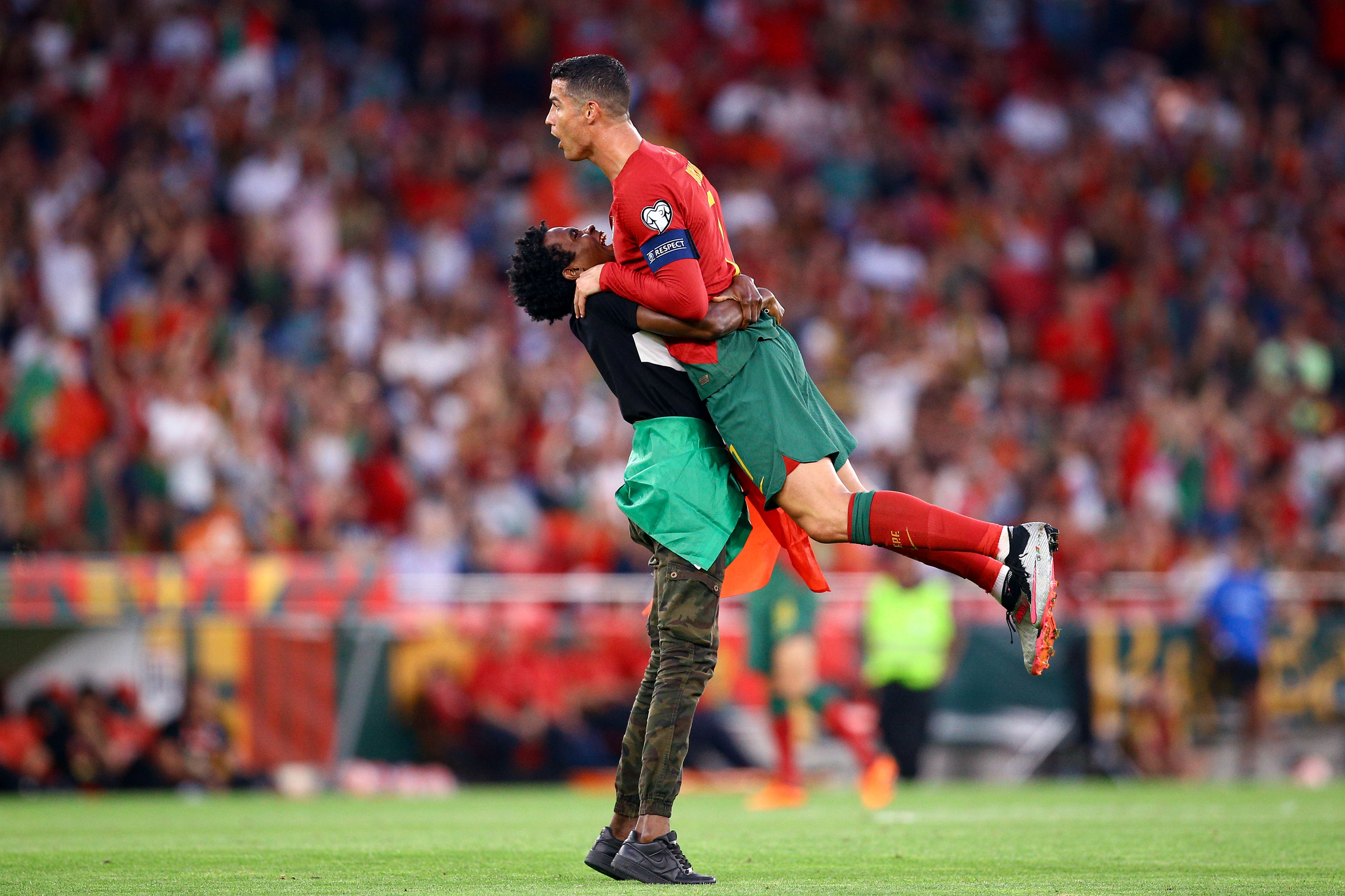 The Astonishing Moment When Ronaldo Was Lifted by a Pitch Intruder During Portugal's Euro Qualifier Against Bosnia 2