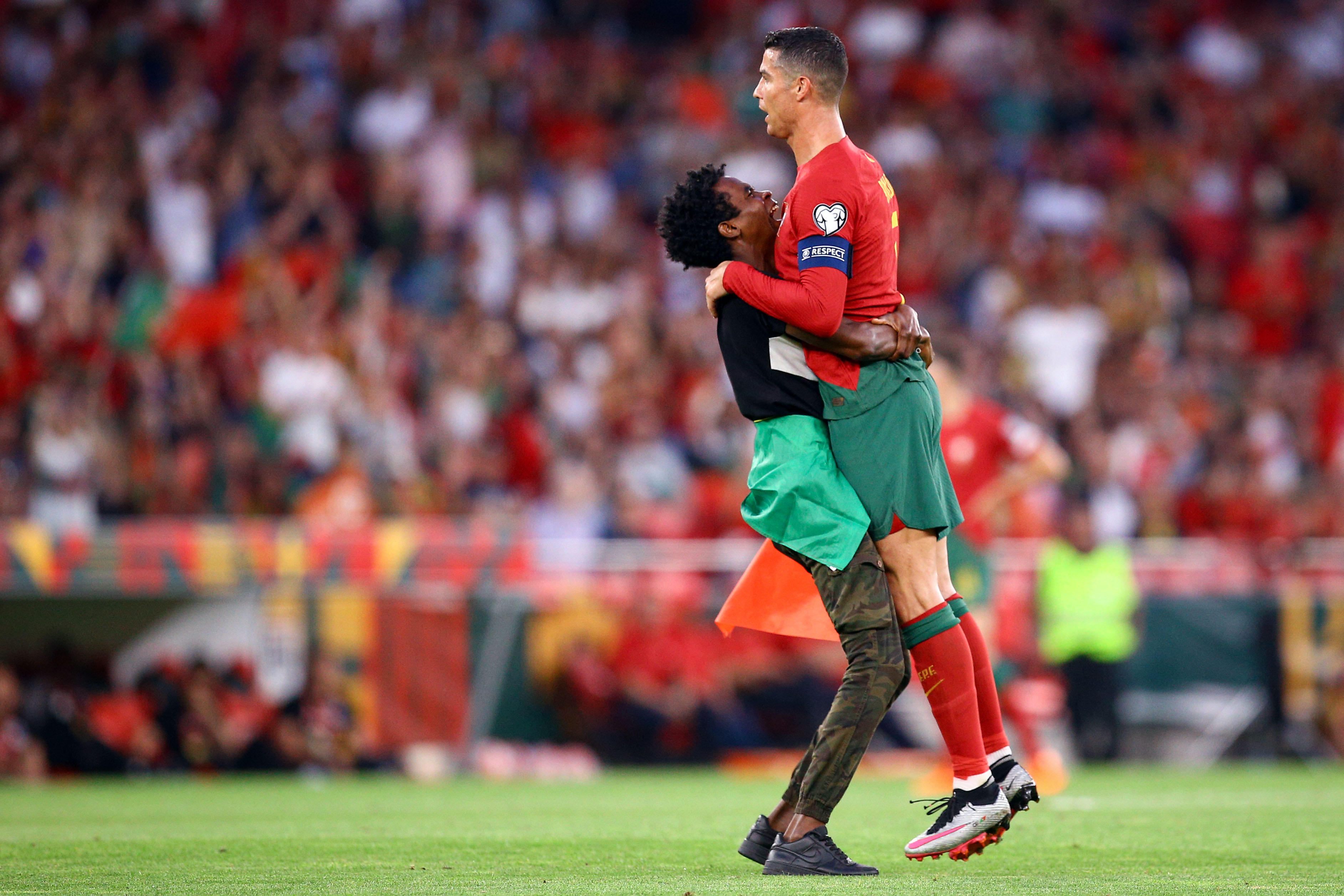 The Astonishing Moment When Ronaldo Was Lifted by a Pitch Intruder During Portugal's Euro Qualifier Against Bosnia 1