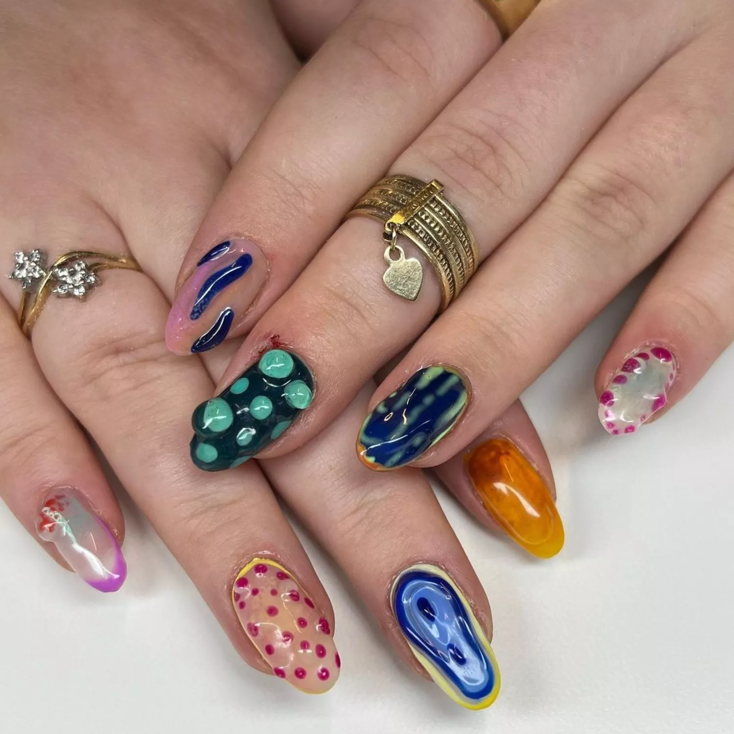 3D Abstract Mismatched Nails - Byrdie 3D Nails