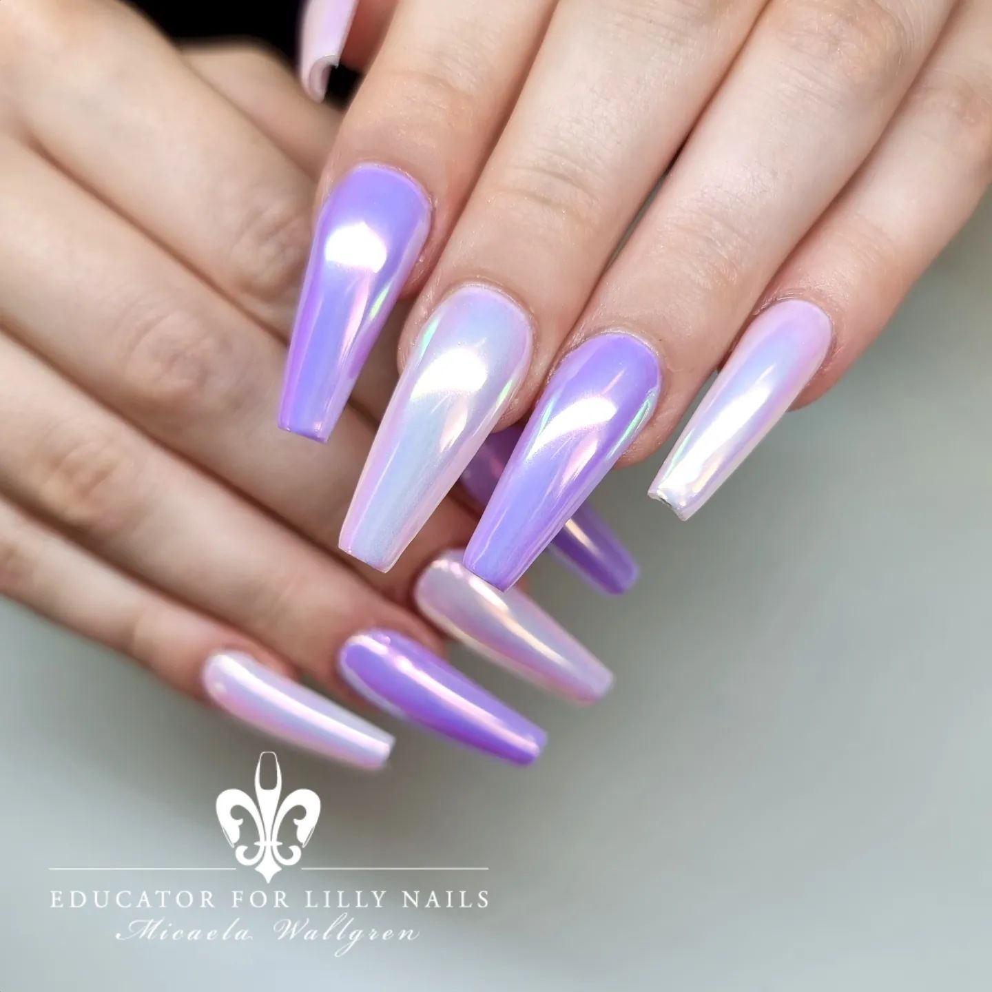 Chrome nails are made to look like the nails of a robot. They are made by painting your nails with a shiny, metallic paint and then adding a layer of clear nail polish over it so it looks shiny. Purple color is a great choice for this type of nails!