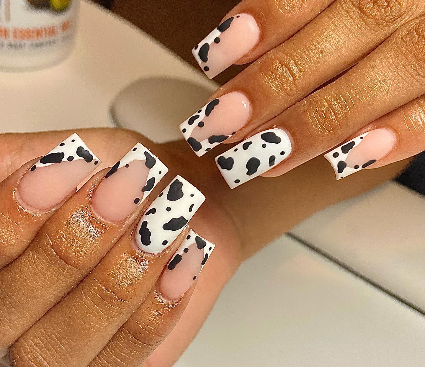 Isn't this nail design lovely? It's nice to see how they're more subtle than your typical French manicure, but still have a little bit of color. If you are looking for a cow print nail design that will make a statement, this is the one you should go for.