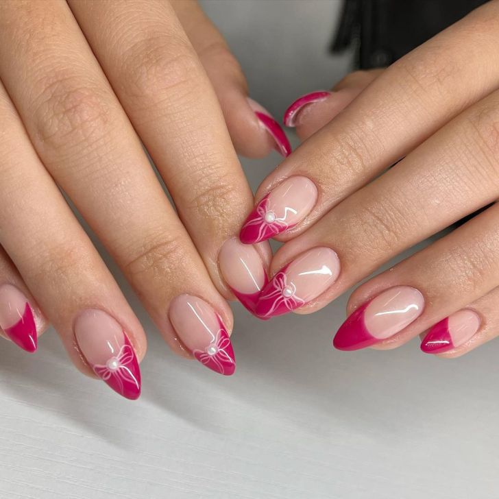 cute pink french tip Valentines Day nails with white bow nail art