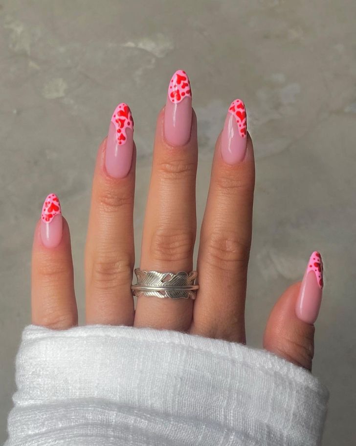 cute pink and red Valentines Day nail ideas with wavy drip style tip designs with heart nail art