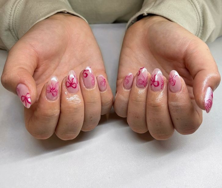 almond shaped cute short Valentines nails with pink bow nail art