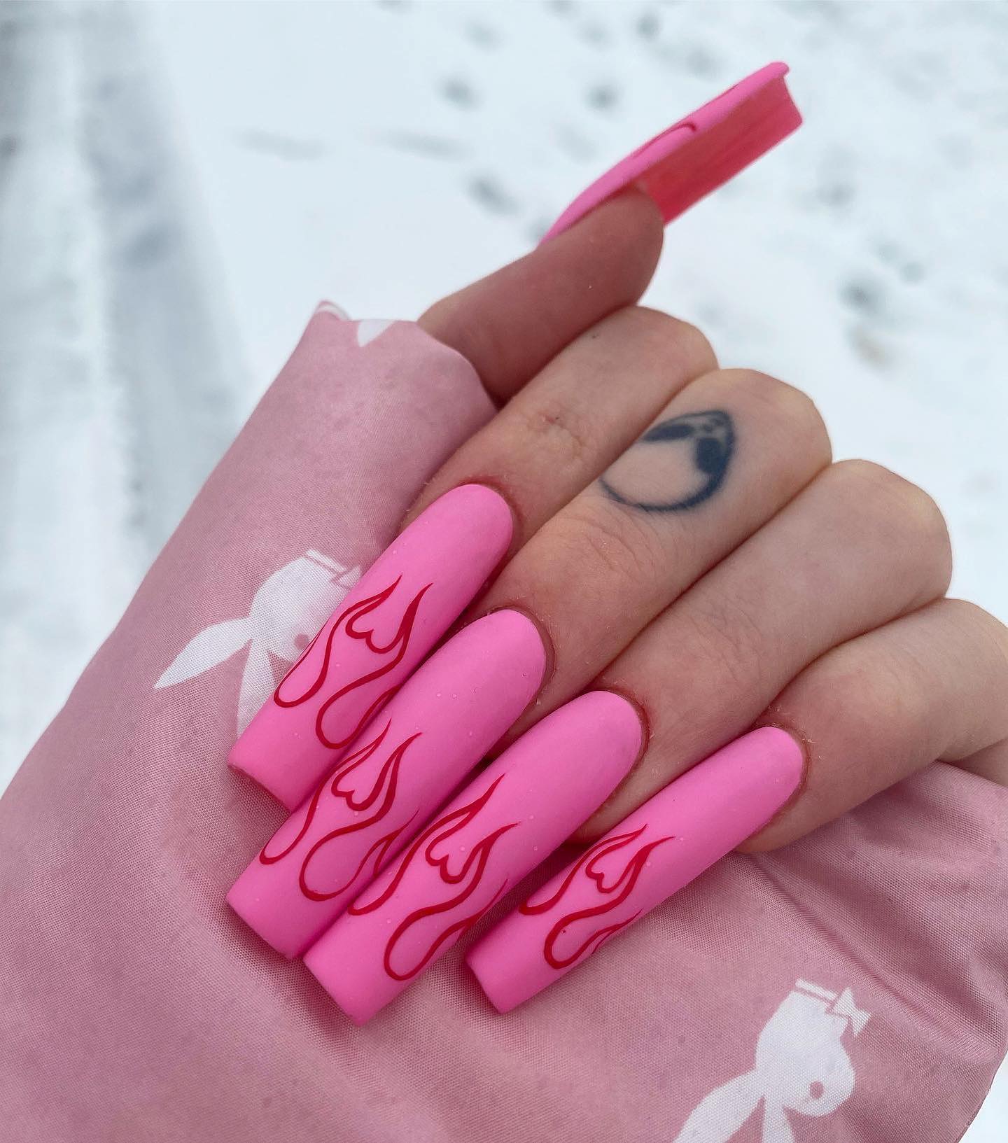 All shades of pink is amazing but baby pink definitely takes a greater look with matte nail polish. Also, it is known that pink and red go together very well, so you need to get your flame nail art red to rock.