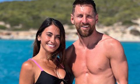 Antonela Roccuzzo enjoys the sun in hot pink bikini with husband Lionel Messi