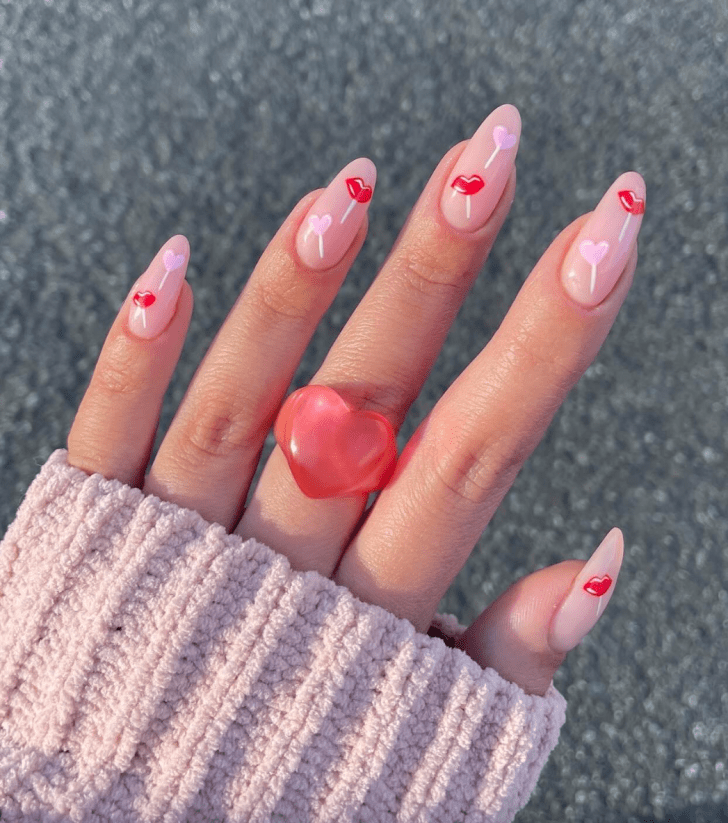 simple Valentines Day nail designs with cute Vday nail art including red lips and pink hearts