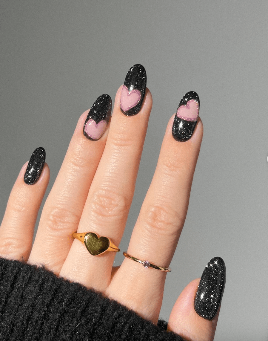 simple glitter pink and black Valentines Day nails with cute heart designs
