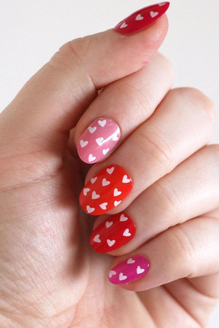 simple pink and red short Valentines nail designs with cute white heart nail art designs