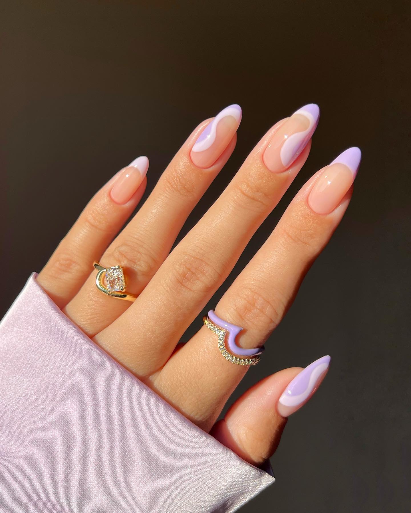 These thick lilac swirls will take your nails to a whole different level, for sure. If you don't like small swirls, this one is for you.