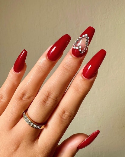 Trendy heart-shaped nail art cut-outs are on-trend for 2024's Aquarius season.