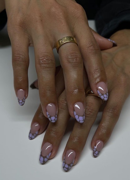 Lavender crocodile printed French tip nails are on-trend for 2024's Aquarius season.