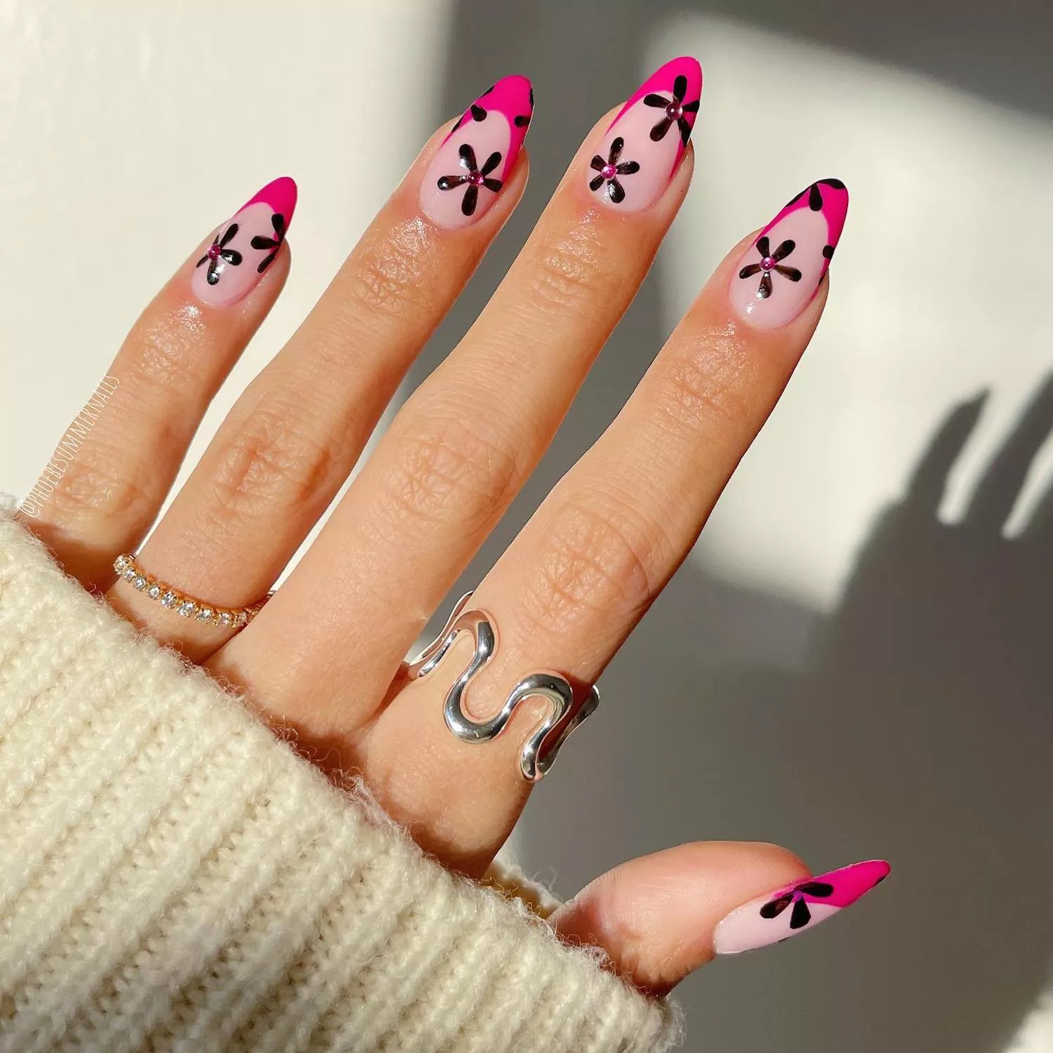 Hot pink French manicure with black daisy retro floral designs
