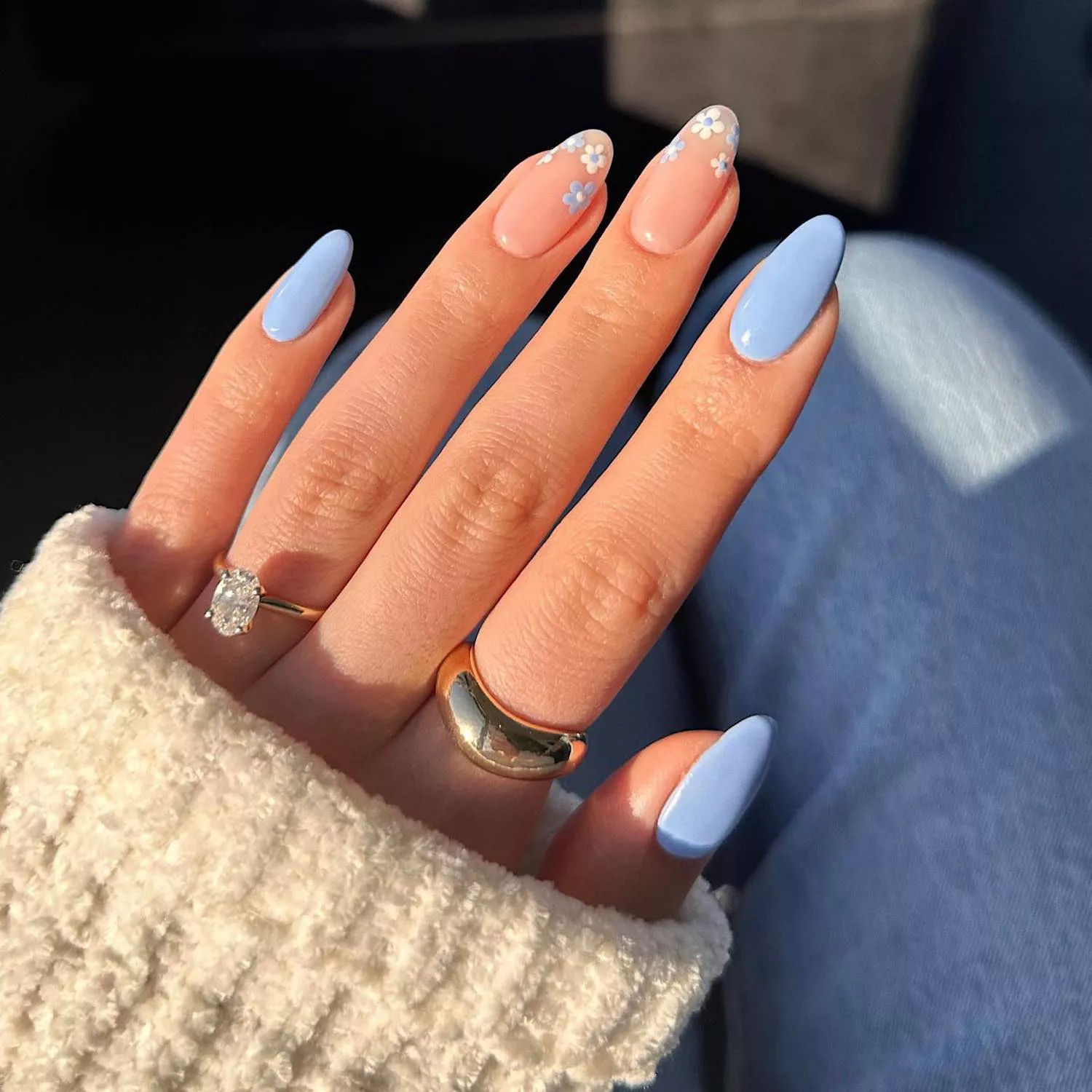 Pastel blue manicure with mini floral tips accent nails