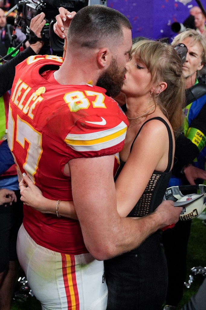 Travis Kelce and Taylor Swift kiss  after the Chiefs beat the 49ers in the Super Bowl at Allegiant Stadium on February 11, 2024 in Las Vegas, Nevada.