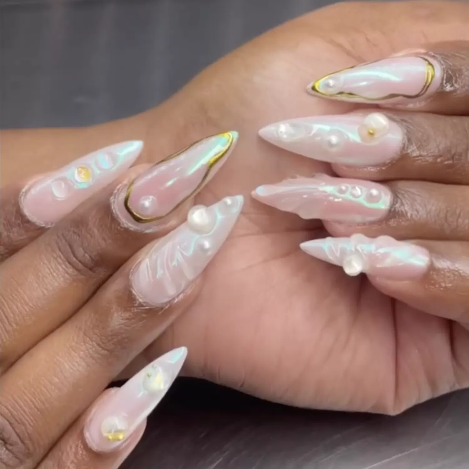 seashell mani with pearls, oysters and shells