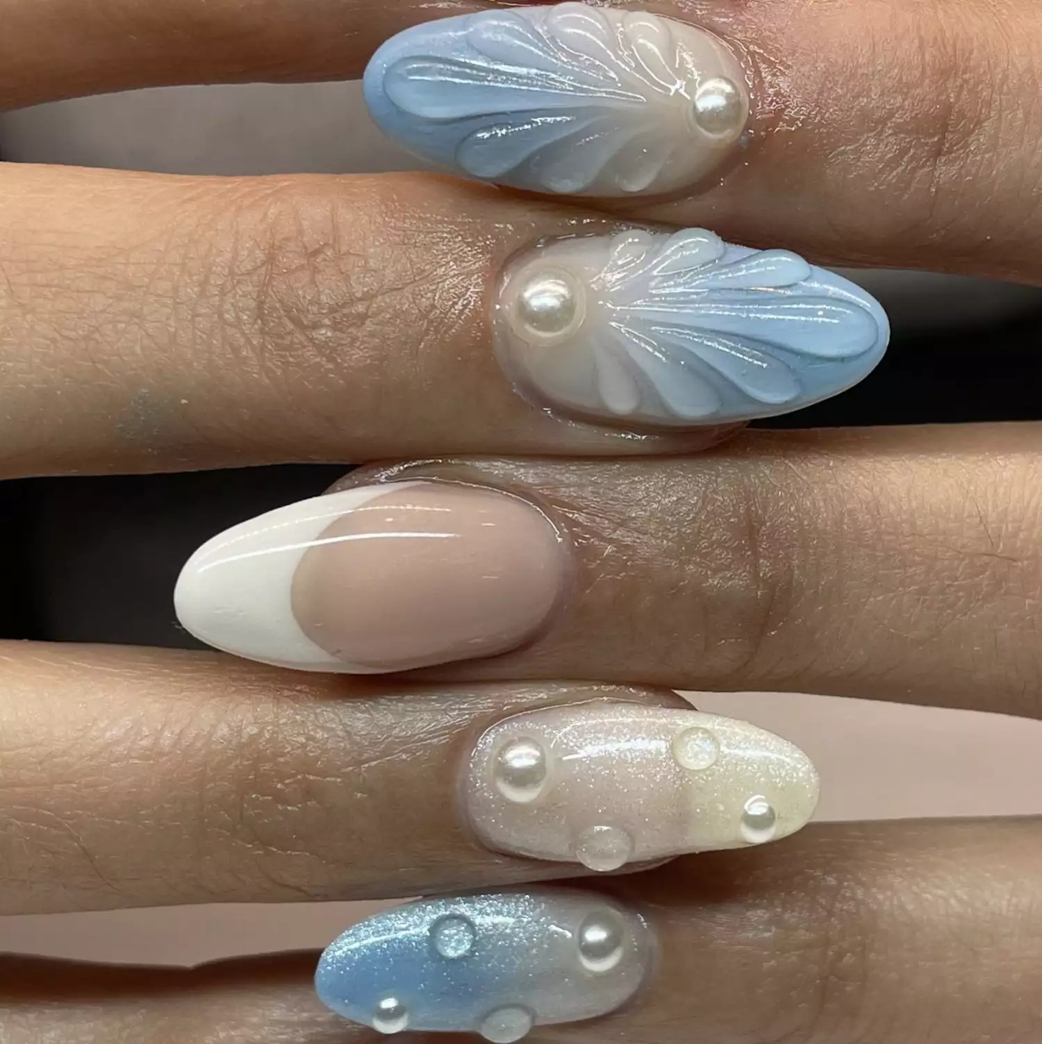 oceanic nail art with seashells and pearls