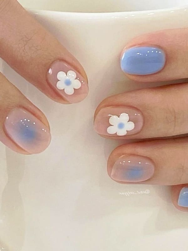 Korean blush nails with floral accents