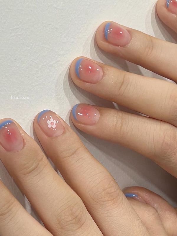 Korean blush nails with floral accents