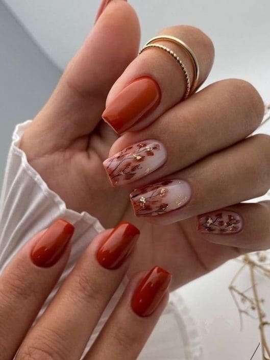 Dark orange short nails with fall flowers