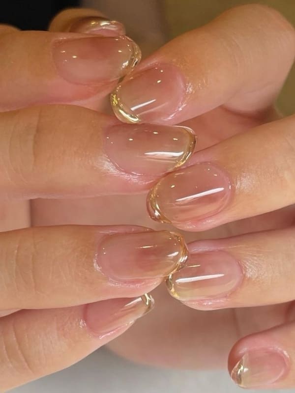 classy gold nails: chrome French tips