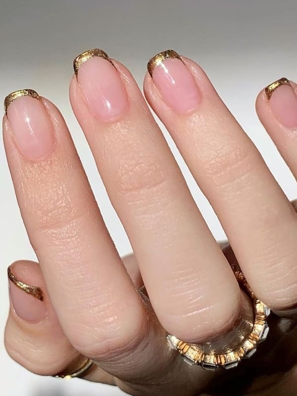 classy gold nails: chrome French tips