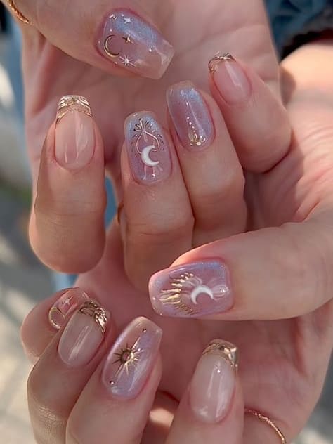 classy gold nails: celestial