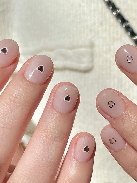 cute Korean heart nail design: milky white nails 