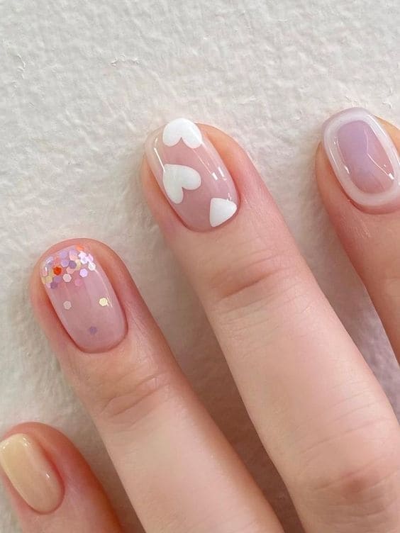 cute Korean heart nail design: white heart accent 