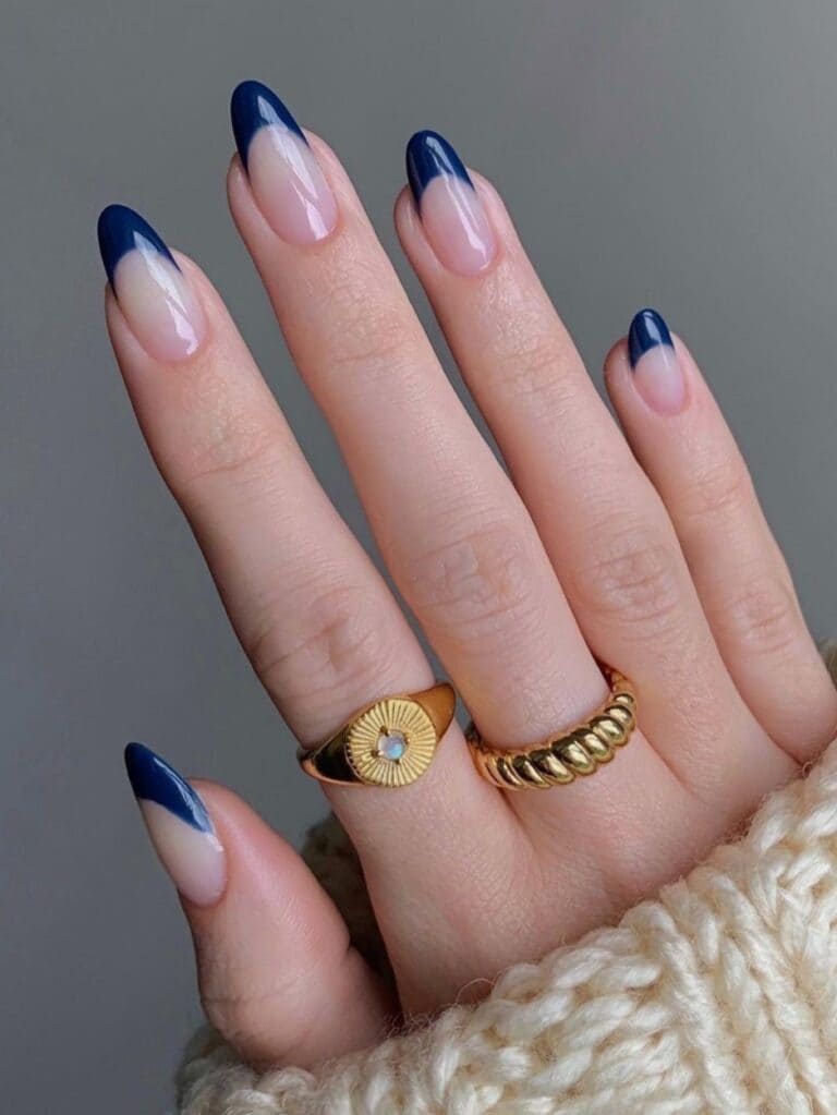 Dark blue French tip nails