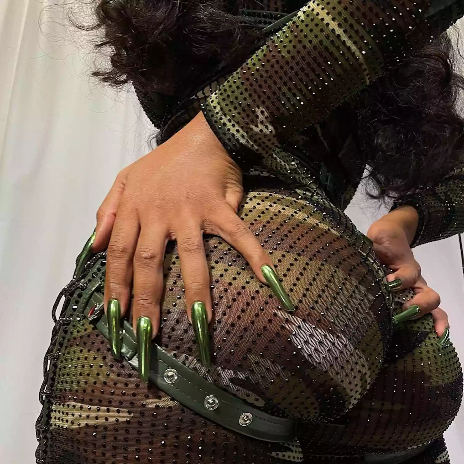 forest green chrome nails on megan thee stallion