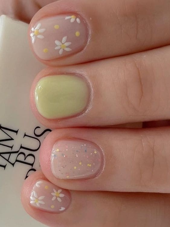 simple flower nail designs: pastel green and florals