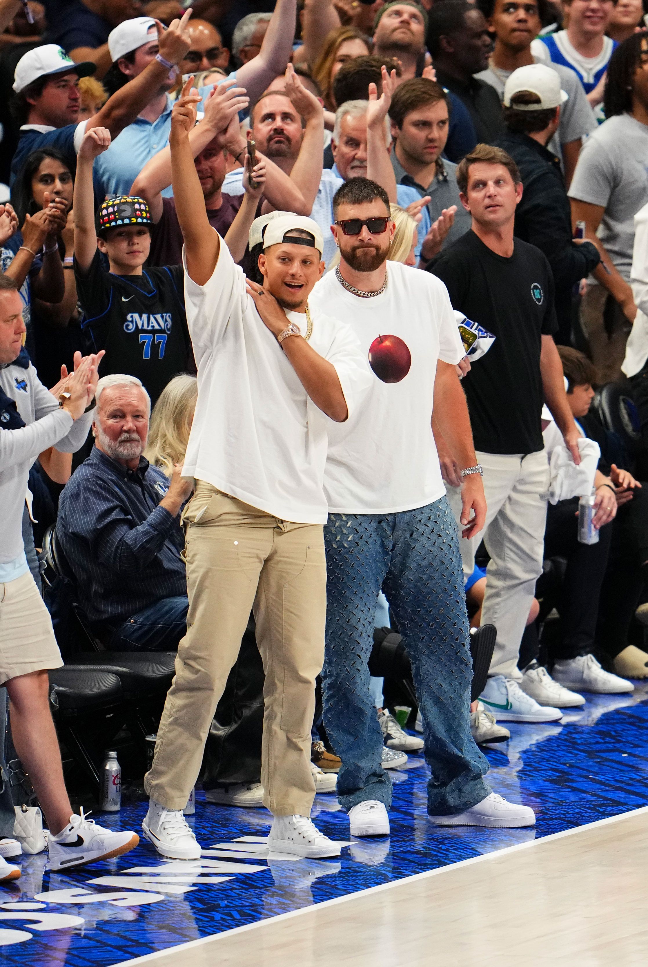 patrick mahomes and travis kelce at the dallas mavericks game on may 26, 2024