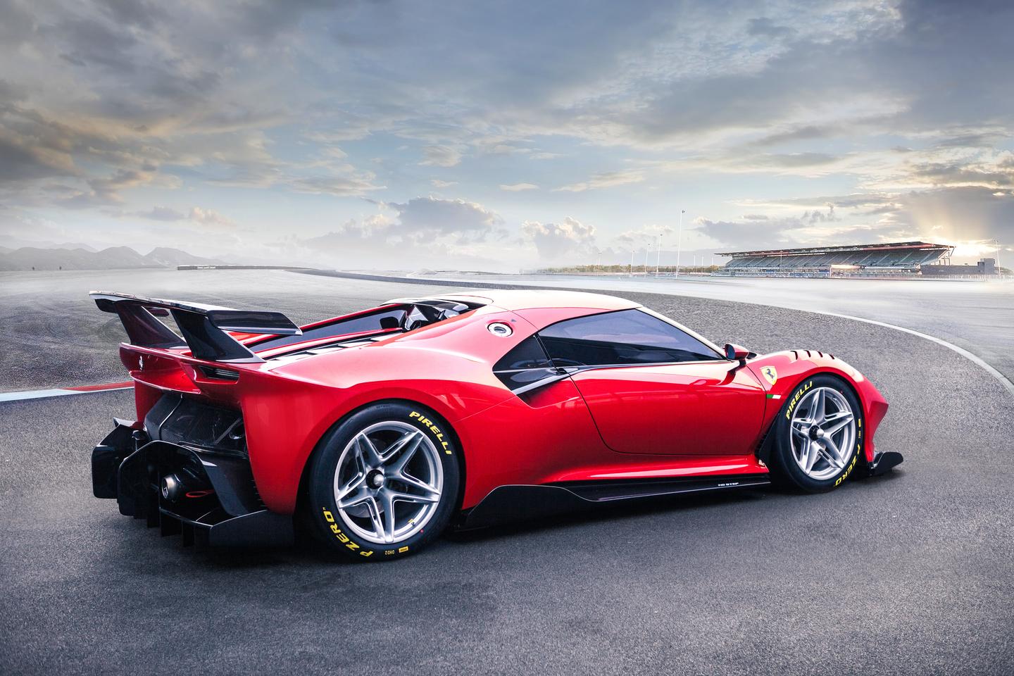 A huge rear wing and massive diffuser setup dominate the rear of the car