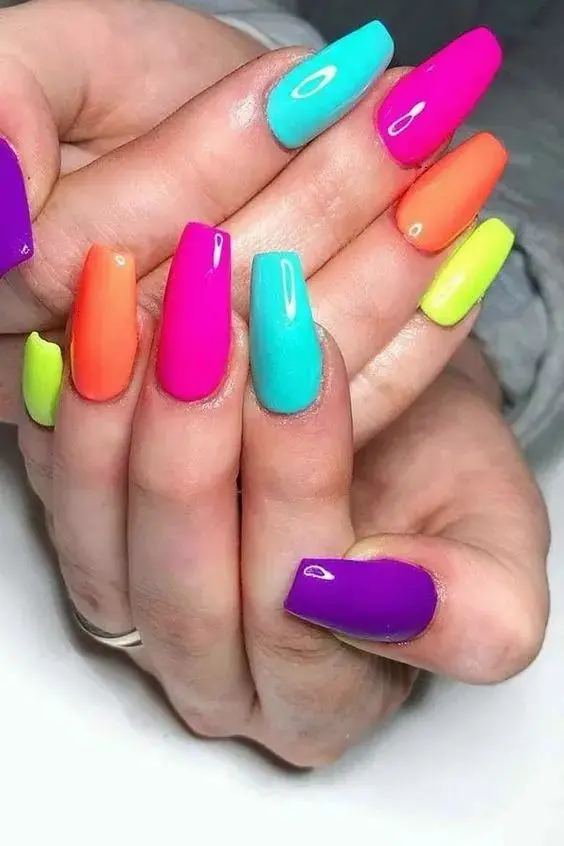 Vivid and lively, these ballerina-shaped nails feature a smooth gradient of neon colors, transitioning from one bright shade to another. The design is playful and eye-catching, suitable for those who love to add a pop of color to their style.