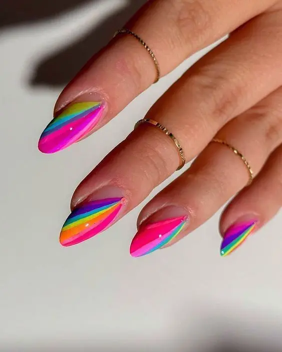 Sleek and modern, these almond-shaped nails boast a vertical neon rainbow gradient blending pink, yellow, green, and blue. The seamless color transition offers a fresh and stylish take on the classic rainbow design, suitable for both casual and formal wear.