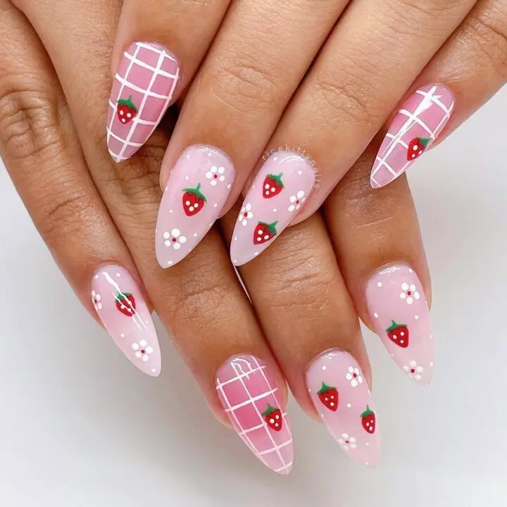 Delicate pink checks and strawberries on a pointed nail design make this style sweet and feminine. The addition of tiny white dots creates a playful yet sophisticated vibe, making it an excellent choice for stylish social gatherings or casual spring days.